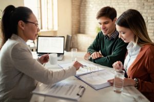 financial advisor helping couple