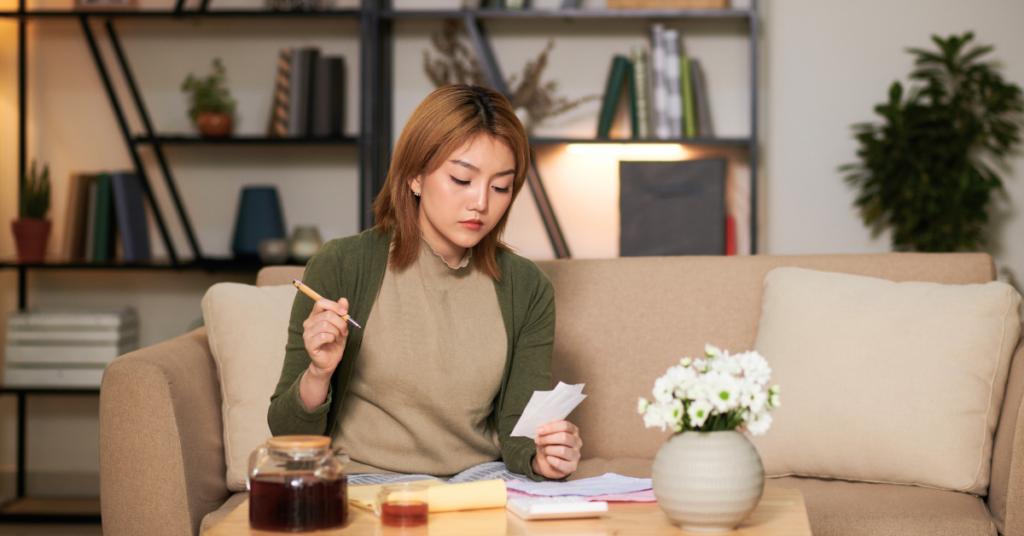 woman in her twenties working on getting a personal loan