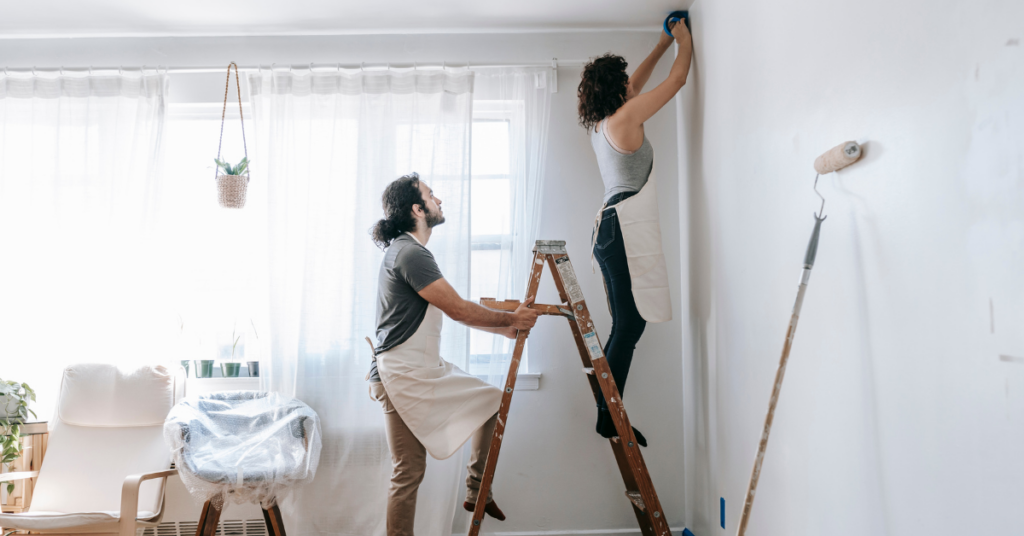 young married couple using a personal loan for home improvement