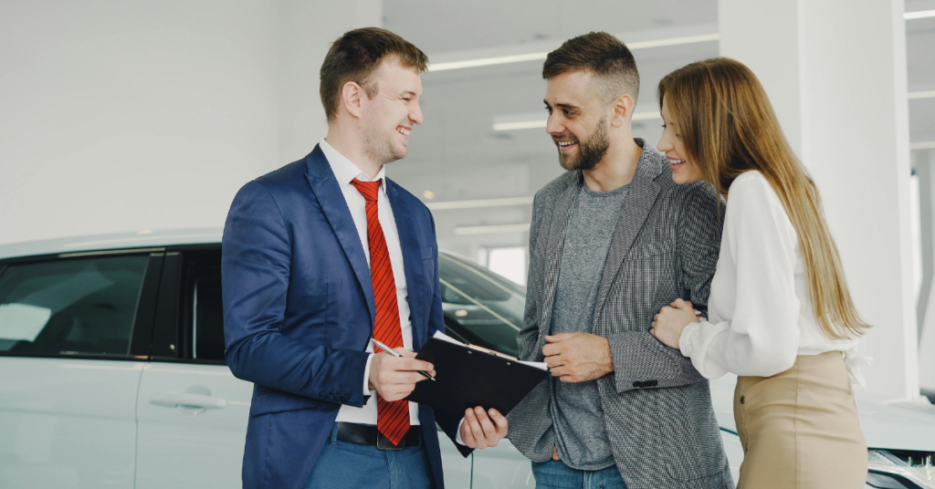 A couple buying a car after getting an auto loan with bad credit.